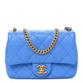 Caviar Quilted Mini Sweetheart Flap Blue
