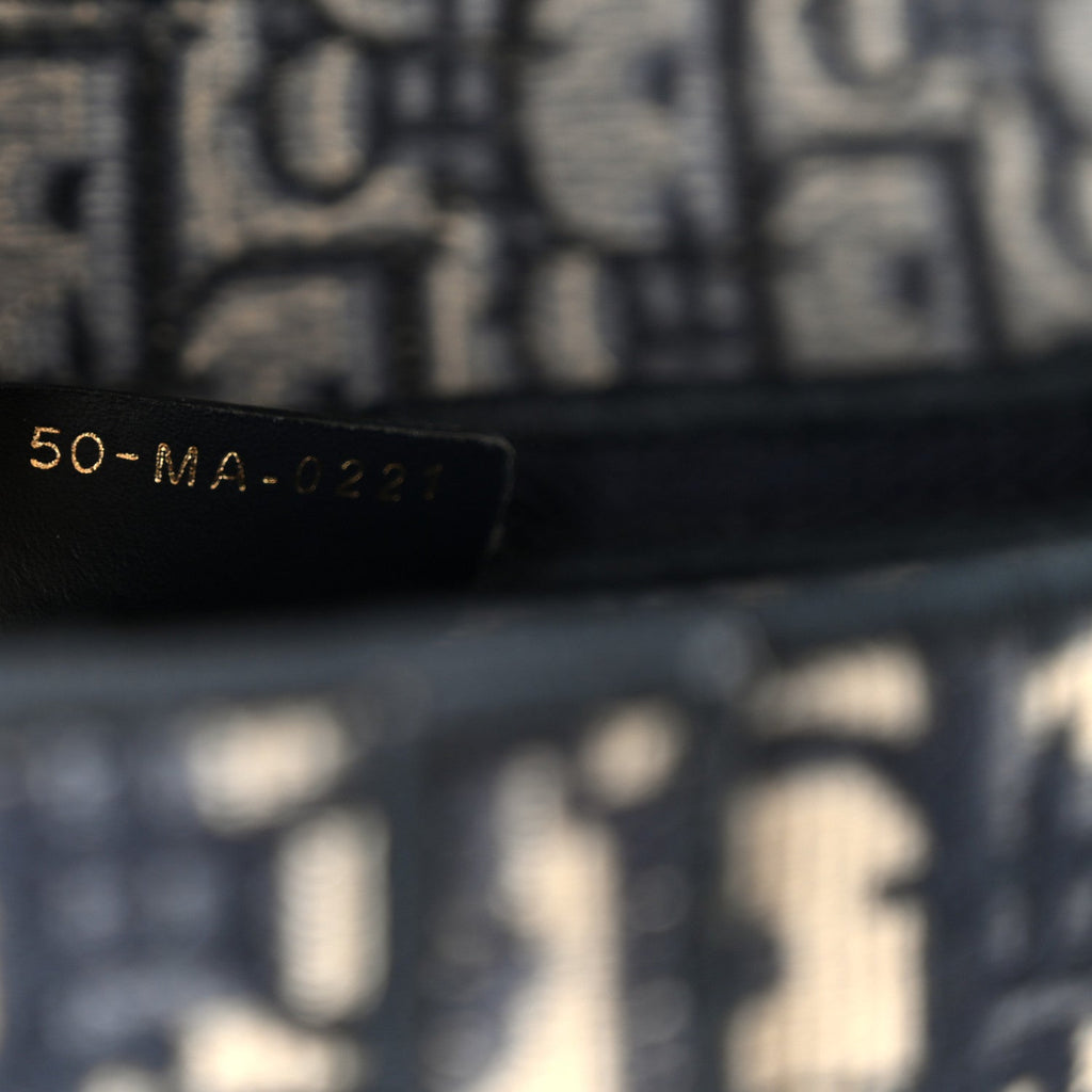 Oblique Embroidered Saddle Bag Blue