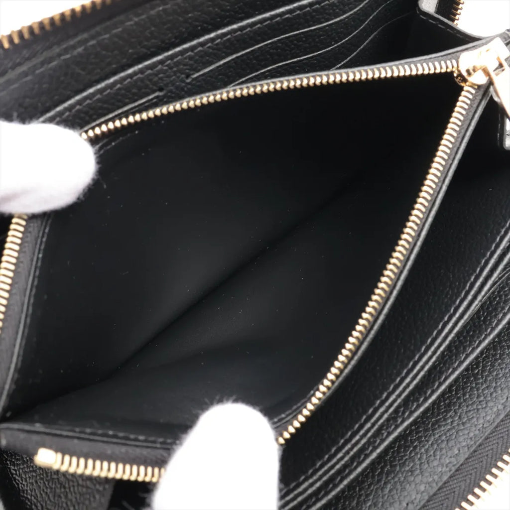 Louis Vuitton Bicolor Monogram Empreinte Zippy Wallet