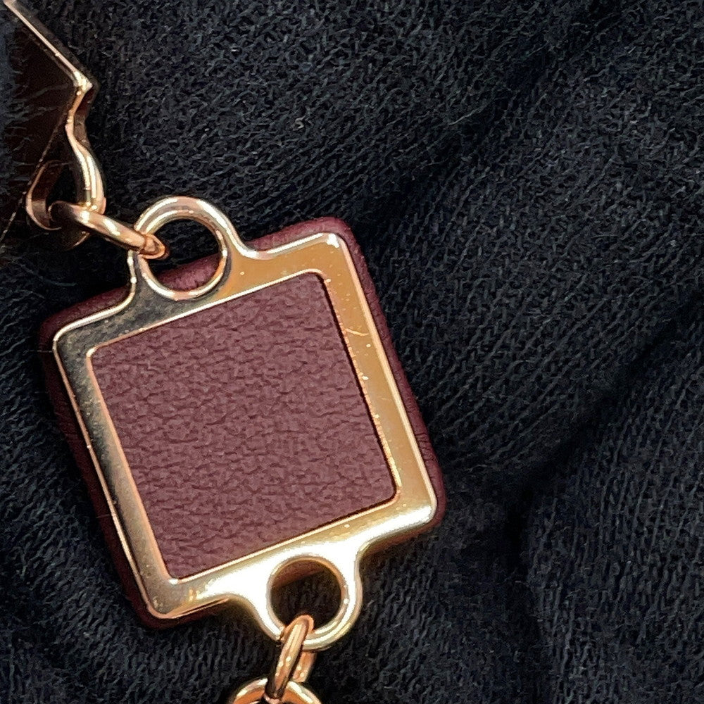 HERMES Disco Fauve Earrings Bordeaux Metal Swift Leather