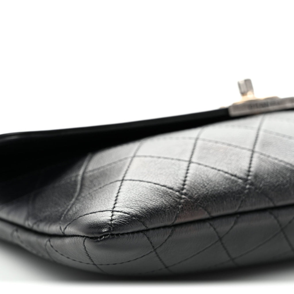 Lambskin Quilted Sleek And Chic Clutch Black