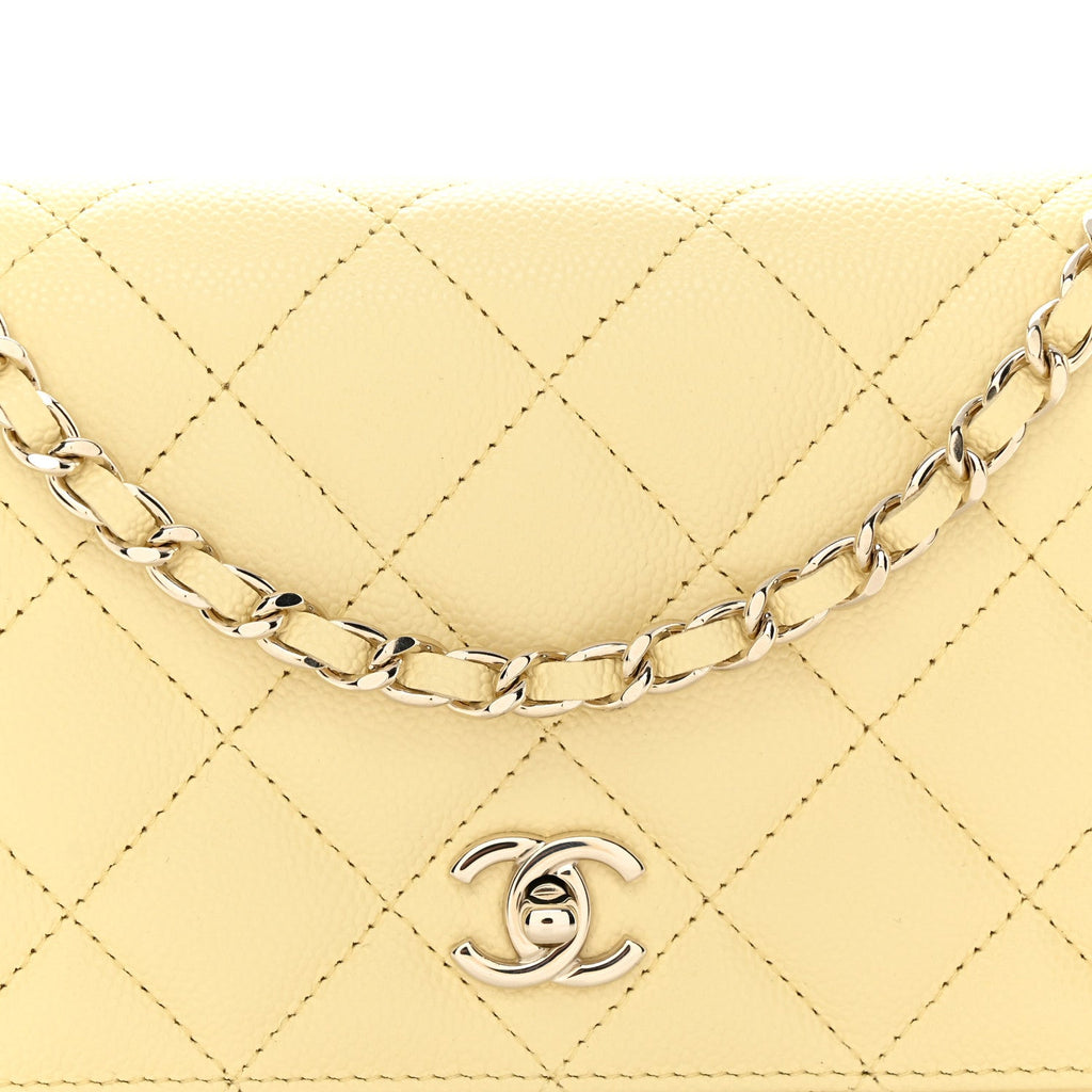 Caviar Quilted CC Turn Lock Wallet On Chain WOC Light Yellow