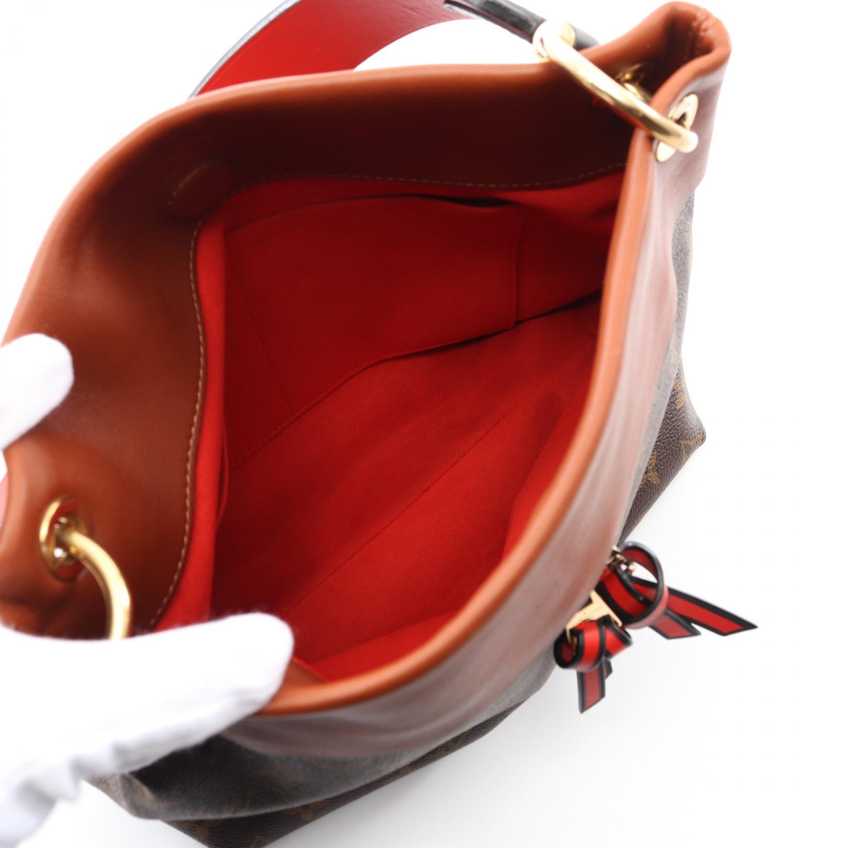 Louis Vuitton Tuileries Besace Monogram Shoulder Bag