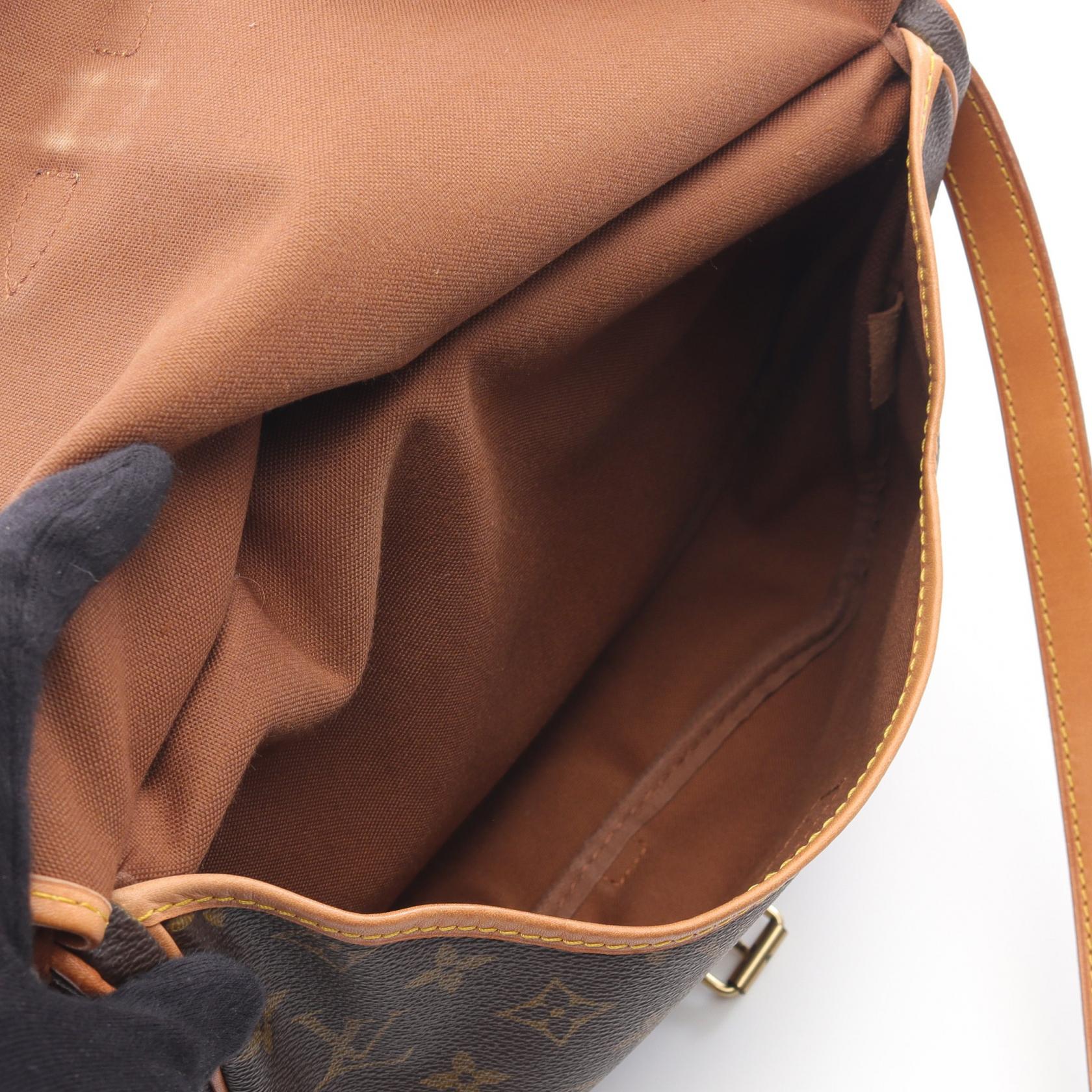 Louis Vuitton Saumur 30 Monogram Coated Canvas Shoulder Bag