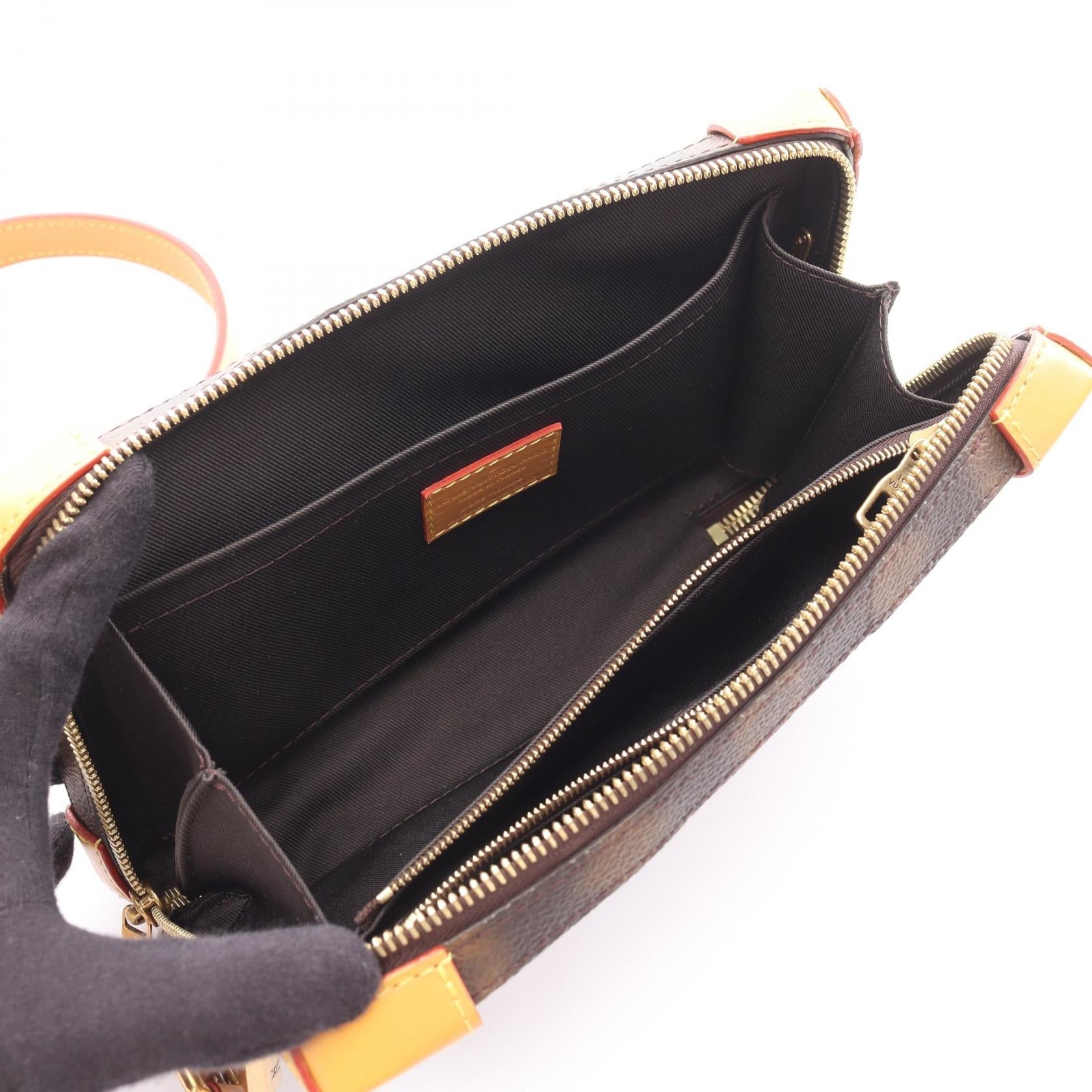 Louis Vuitton Soft Trunk This is Not Monogram Coated Canvas Shoulder Bag