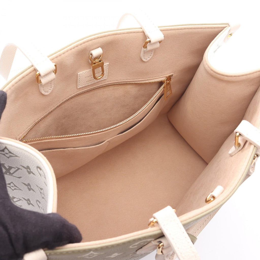 Louis Vuitton OnTheGo MM Monogram Empreinte Leather Tote Bag