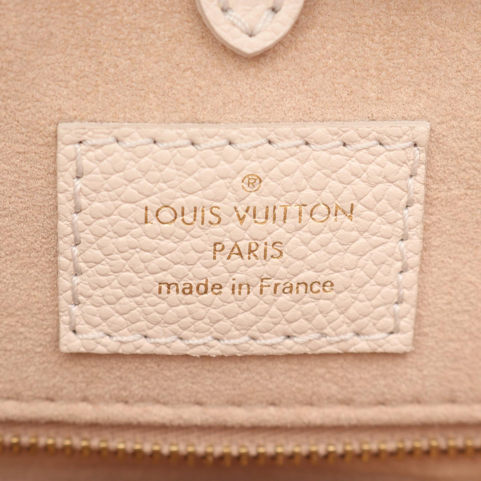 Louis Vuitton OnTheGo MM Monogram Empreinte Leather Tote Bag
