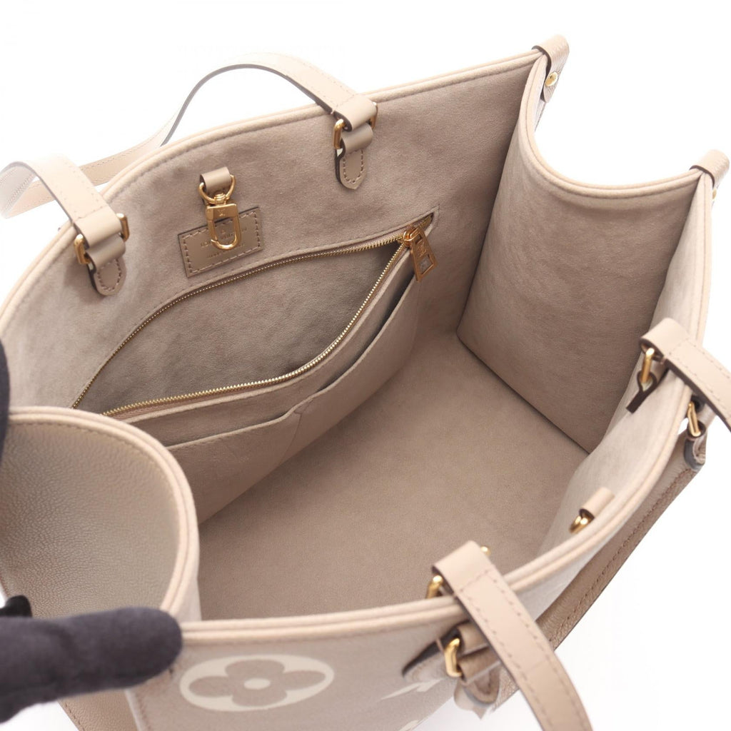 Louis Vuitton OnTheGo MM Monogram Empreinte Tote Bag