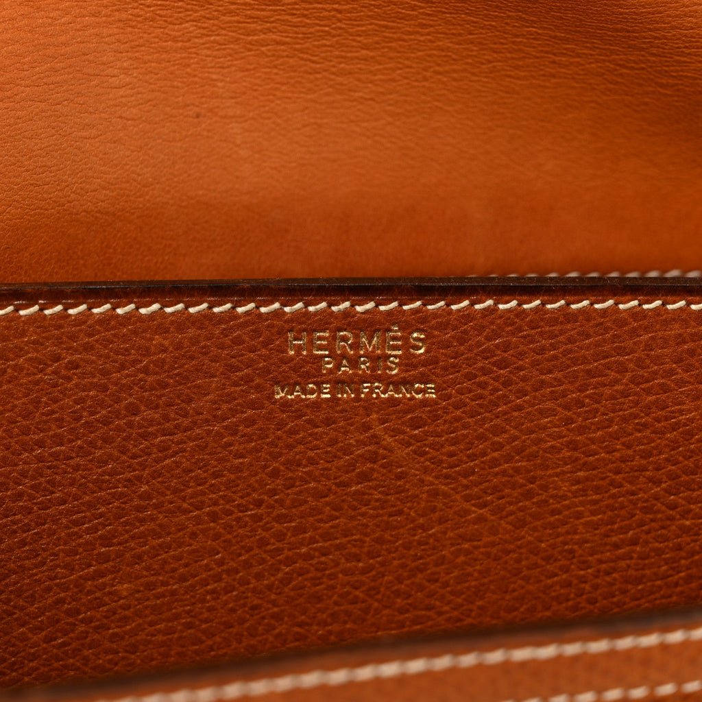 Canvas Courchevel Medor Clutch Gold Brown