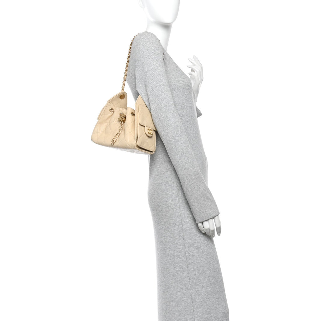 Caviar Quilted Mini Chanel 25 Handbag Beige