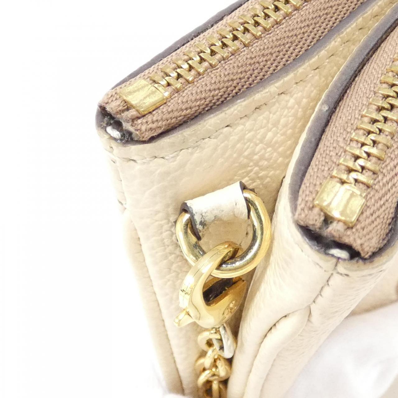 Louis Vuitton Pochette Double Zip Monogram Empreinte Shoulder Bag