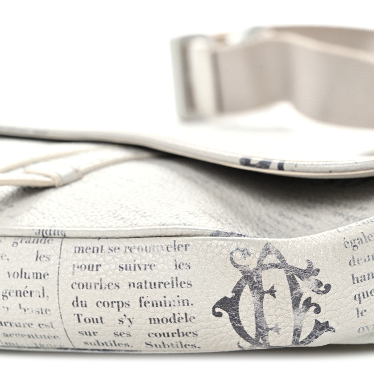 X Daniel Arsham Grained Calfskin Newspaper Print Saddle Bag White