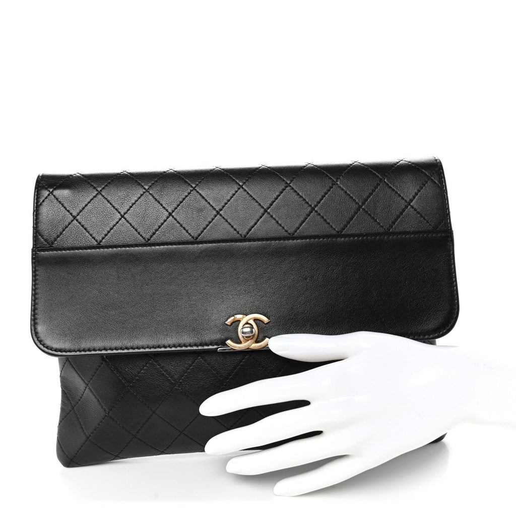 Lambskin Quilted Sleek And Chic Clutch Black