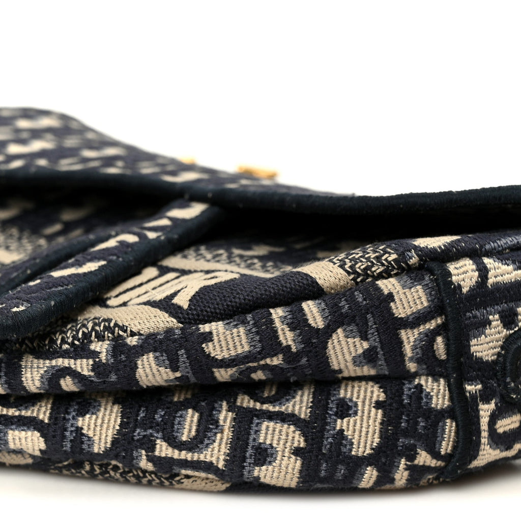 Oblique Embroidered Saddle Bag Blue
