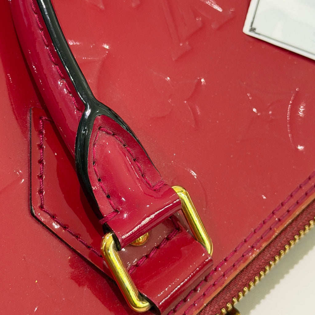 LOUIS VUITTON ALMA MEDIUM RED VERNIS LEATHER HANDBAG