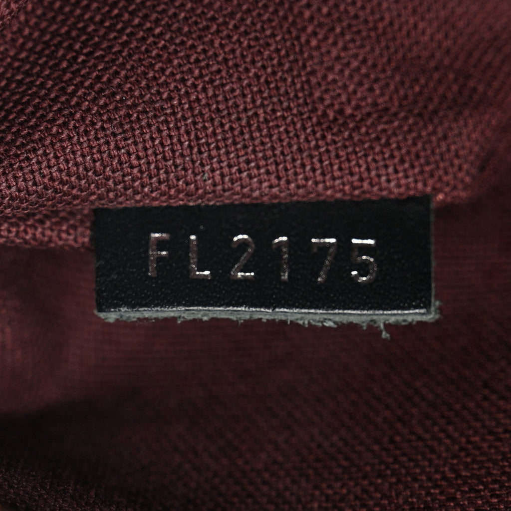 Monogram Macassar District PM