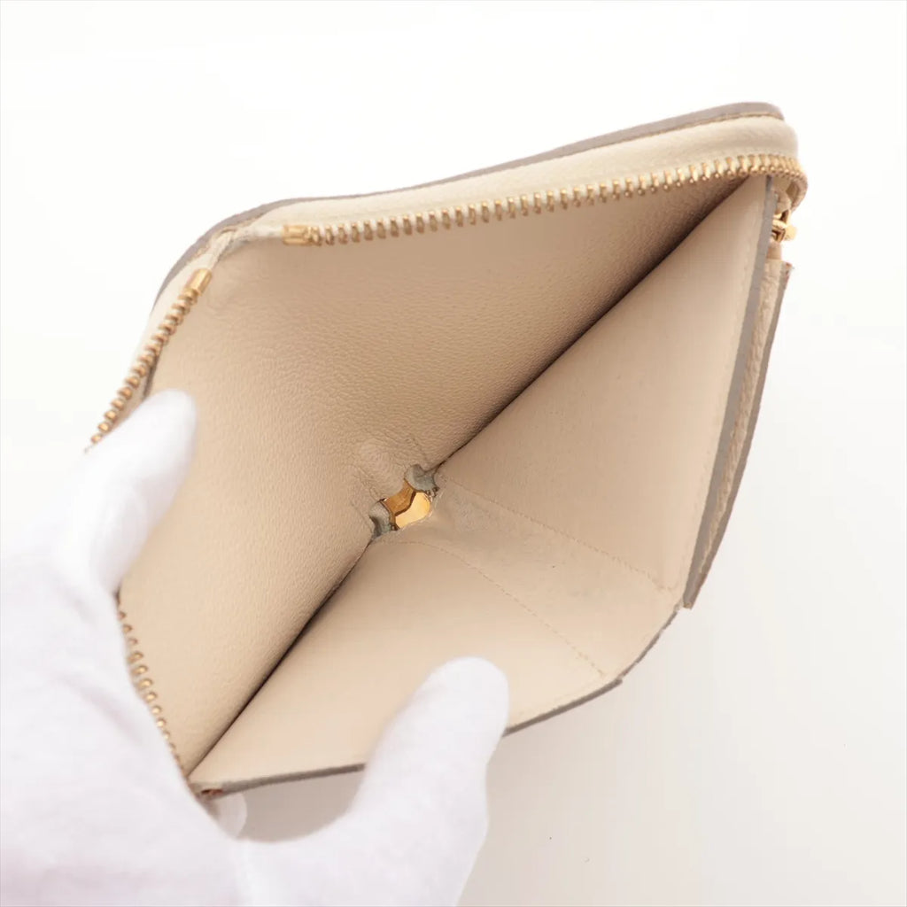 Louis Vuitton Empreinte Secret Zippy Wallet