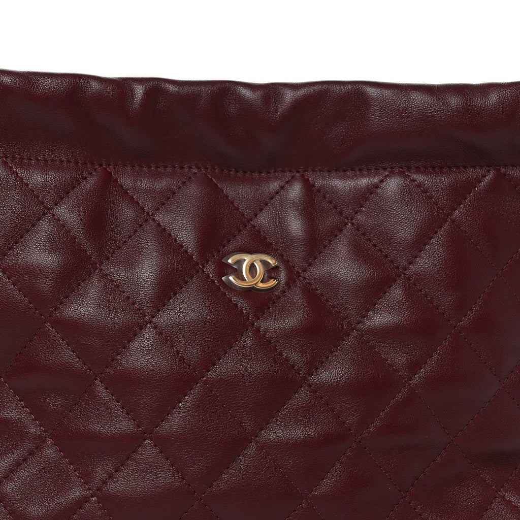 Lambskin Quilted Drawstring Clutch With Strap Dark Burgundy