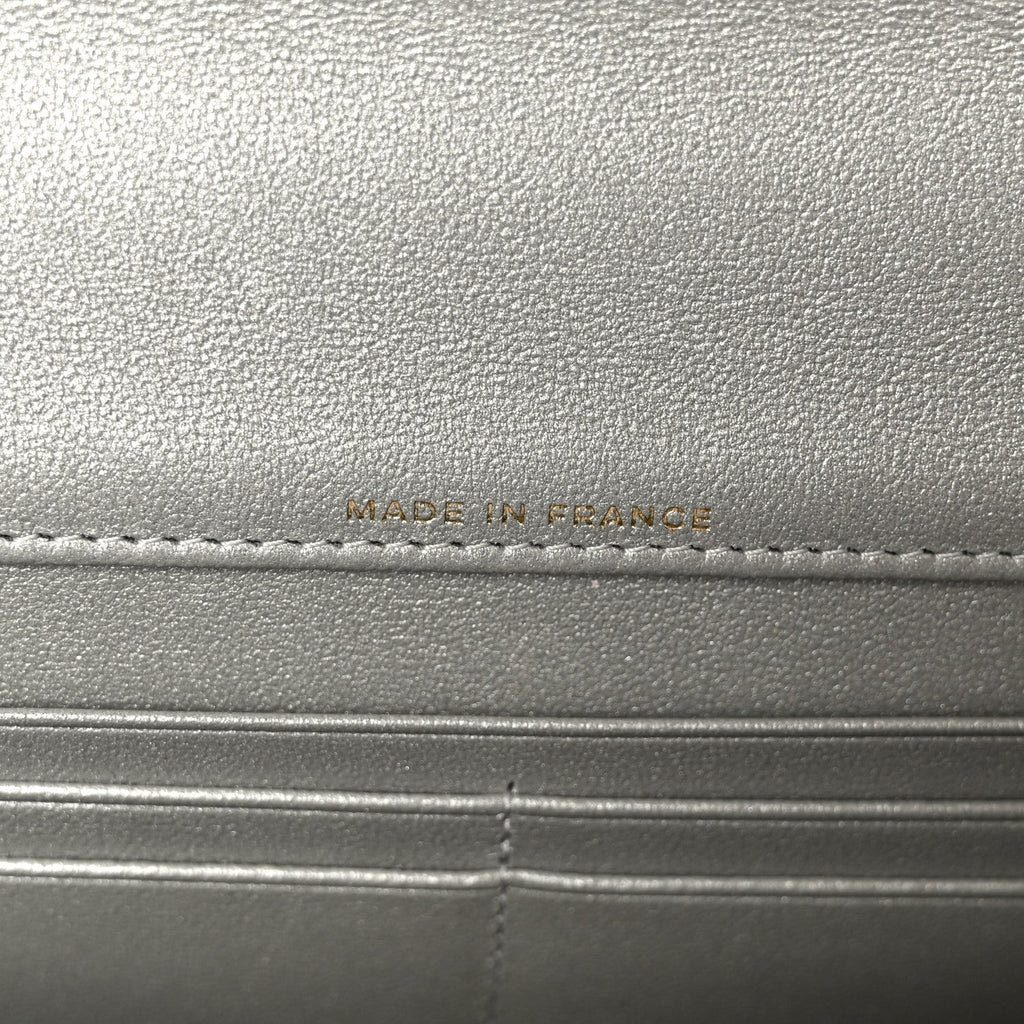 Metallic Caviar Quilted Top Handle Long Clutch With Chain Silver