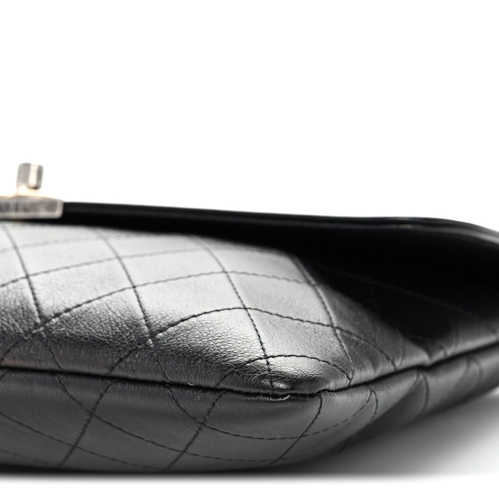 Lambskin Quilted Sleek And Chic Clutch Black