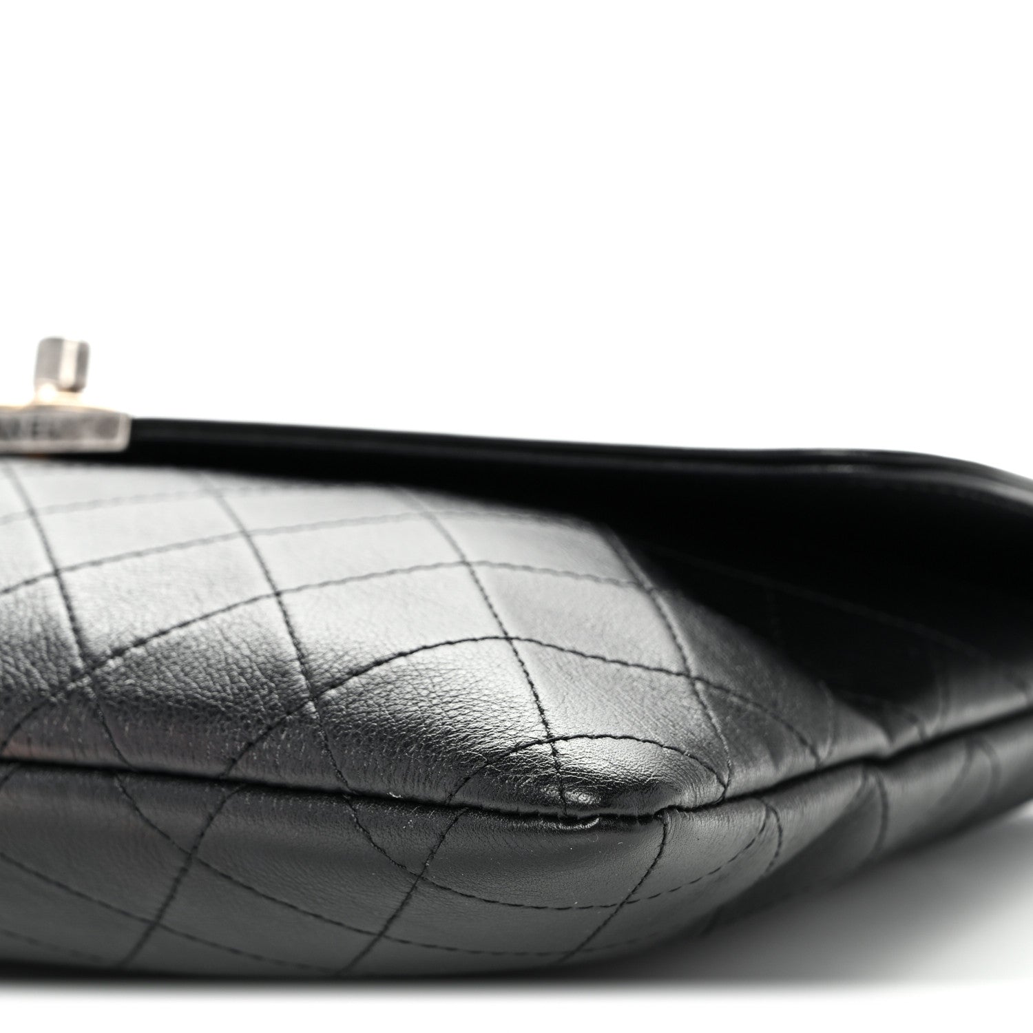 Lambskin Quilted Sleek And Chic Clutch Black