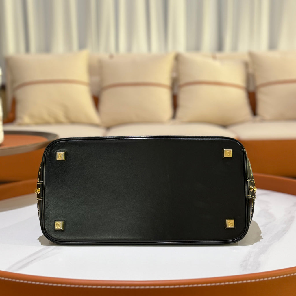LOUIS VUITTON SUHALI LOCK IT MM