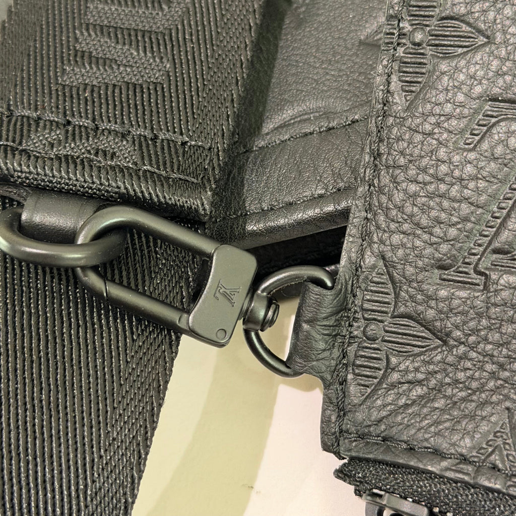 Louis Vuitton Gaston Wearable Wallet Embossed Leather Crossbody Bag