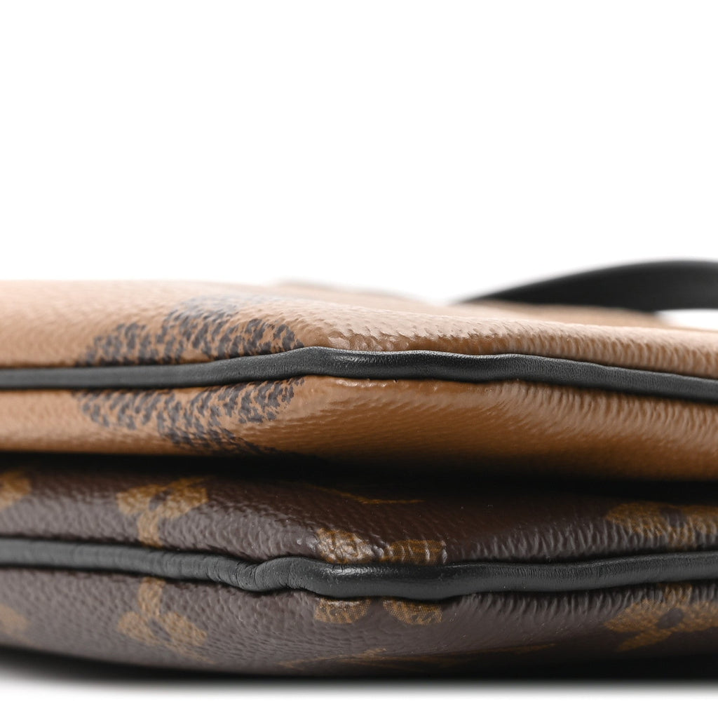 Reverse Monogram Giant Double Zip Pochette