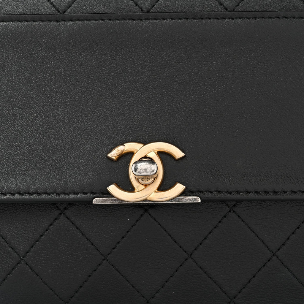 Lambskin Quilted Sleek And Chic Clutch Black