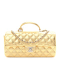 Metallic Caviar Quilted Top Handle East West Flap Gold