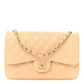 Caviar Quilted Jumbo Double Flap Beige Clair
