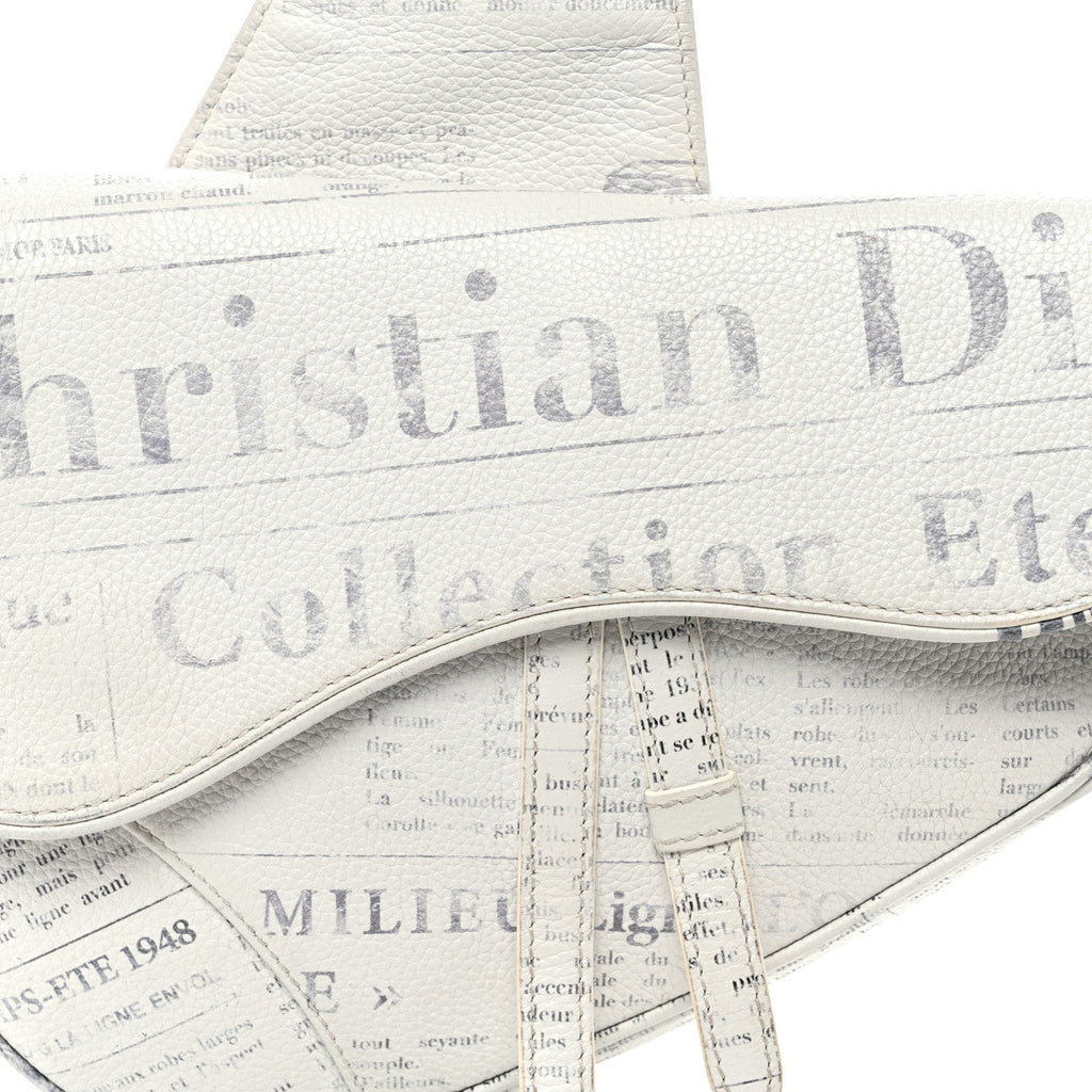 X Daniel Arsham Grained Calfskin Newspaper Print Saddle Bag White