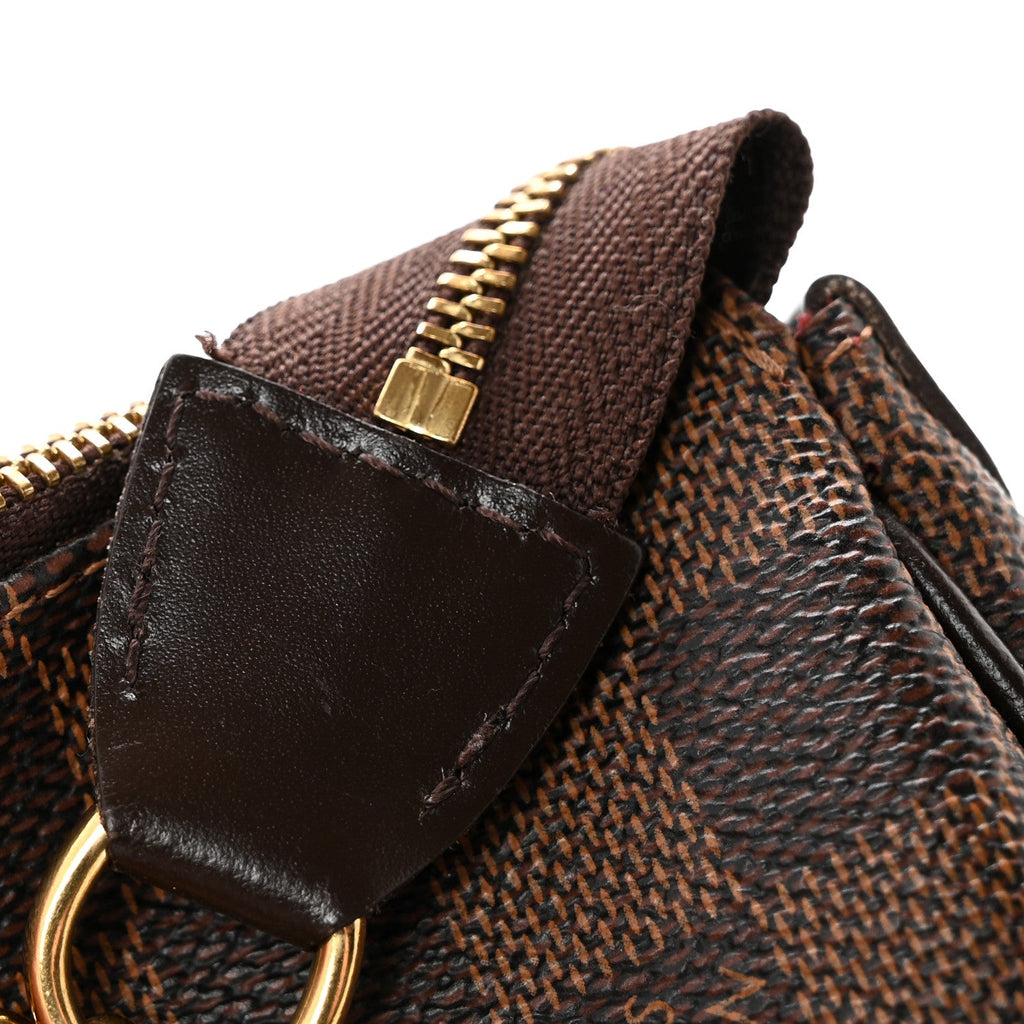 Damier Ebene Eva Clutch