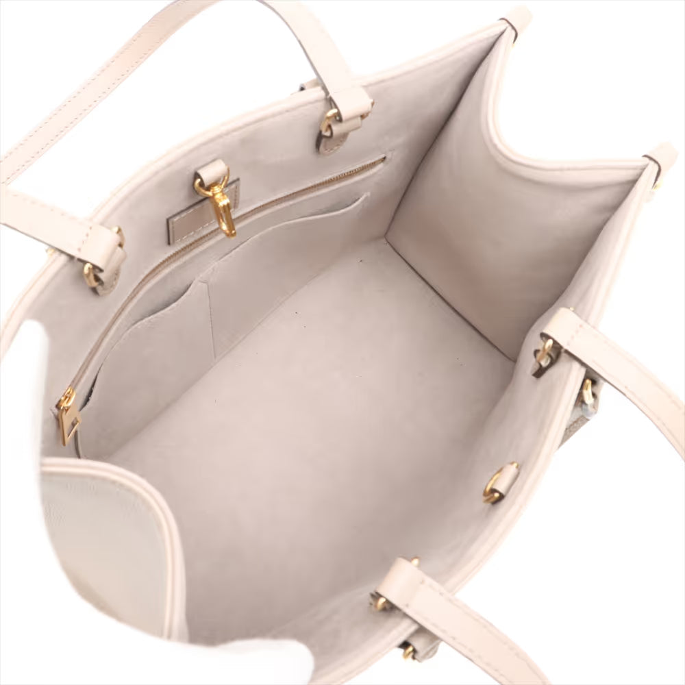 Louis Vuitton Bicolor Monogram Giant On the Go MM Dove x Cream