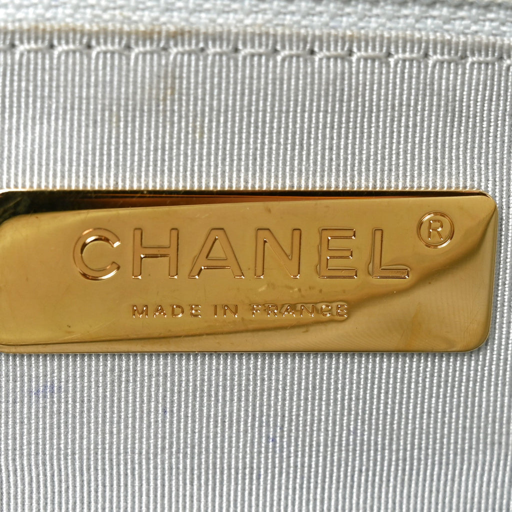 Iridescent Calfskin Quilted Medium Chanel 19 Flap White