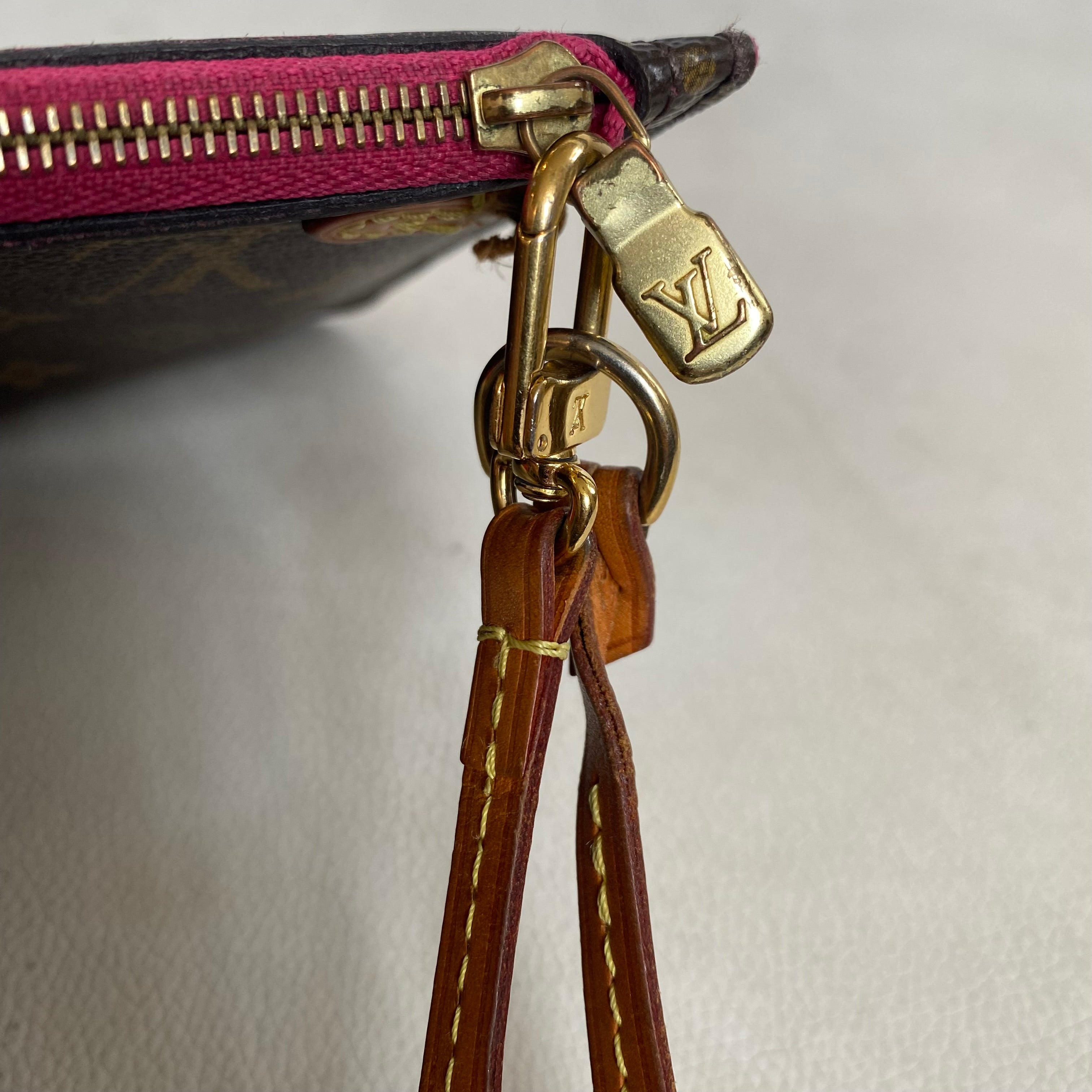 LOUIS VUITTON Monogram Neverfull GM Wristlet