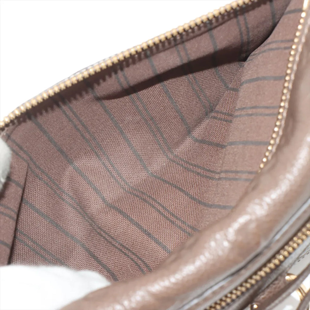 Louis Vuitton Monogram Empreinte Petillante Brown
