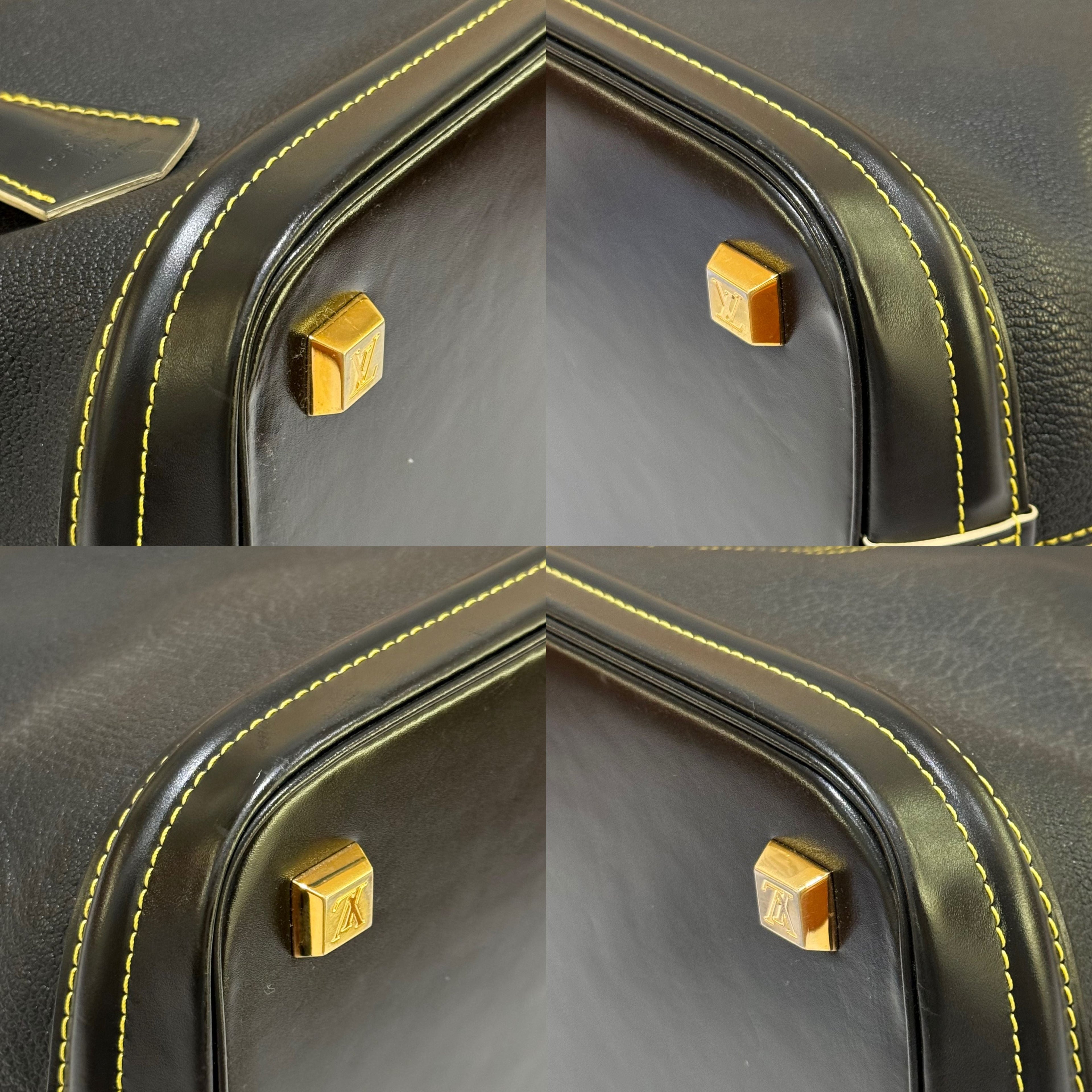 LOUIS VUITTON SUHALI LOCK IT MM