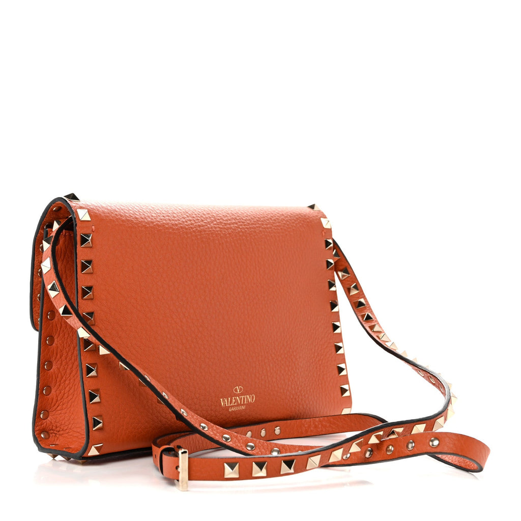 Pebbled Calfskin Medium Rockstud Flip Lock Crossbody Bag Orange