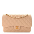 Caviar Quilted Jumbo Double Flap Light Beige