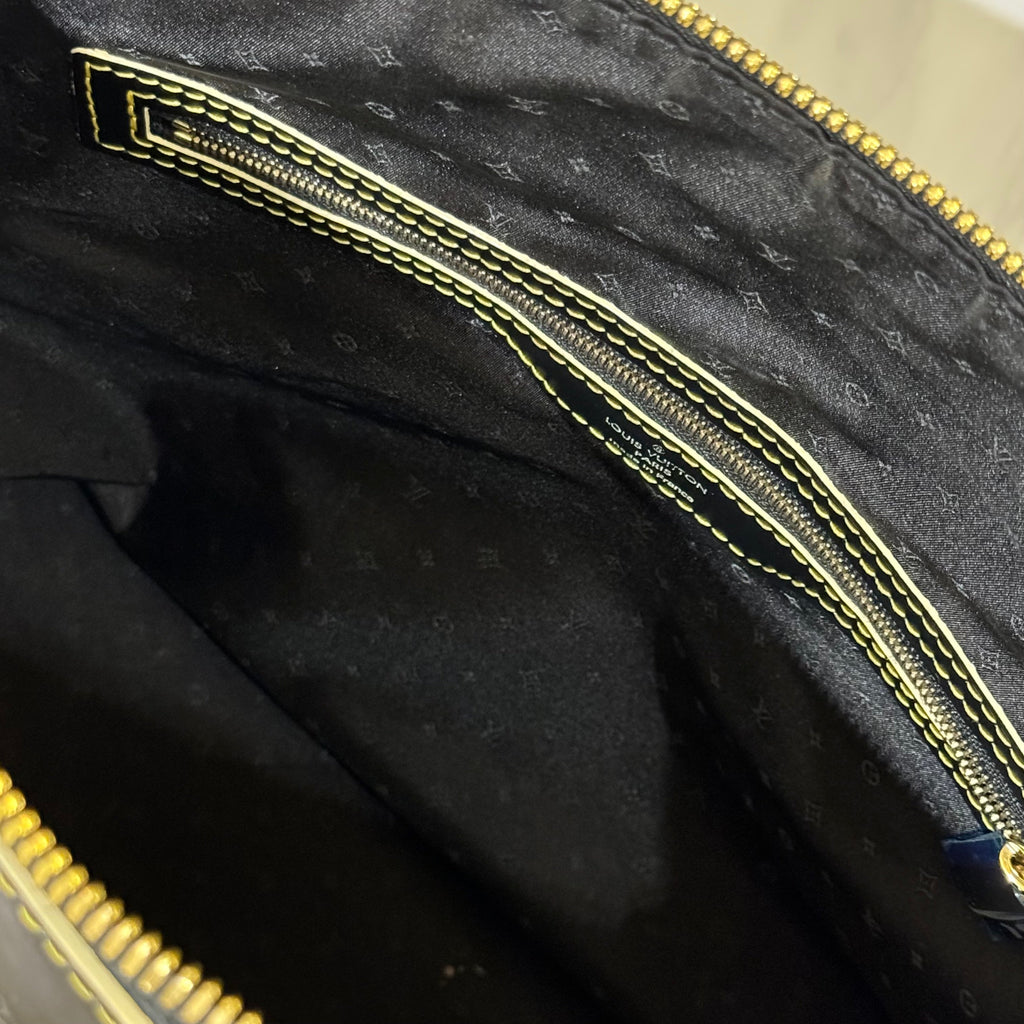 LOUIS VUITTON SUHALI LOCK IT MM