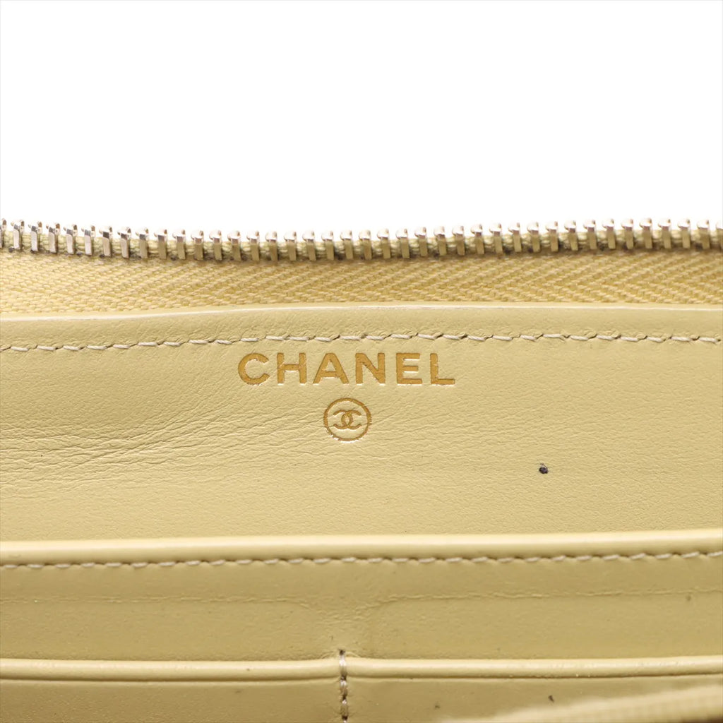 Chanel CC Logo Matelasse Caviar Skin Zippy Wallet Yellow