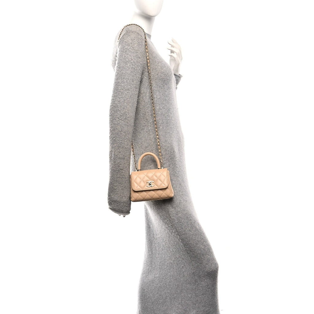 Caviar Quilted Coco Handle Clutch With Chain Beige