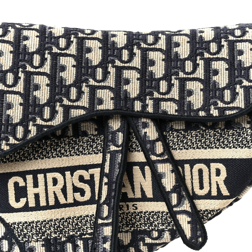 Oblique Embroidered Saddle Bag Blue