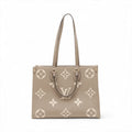 Louis Vuitton Tourterelle Bicolor Monogram Empreinte Leather OnTheGo MM [Clearance Sale]