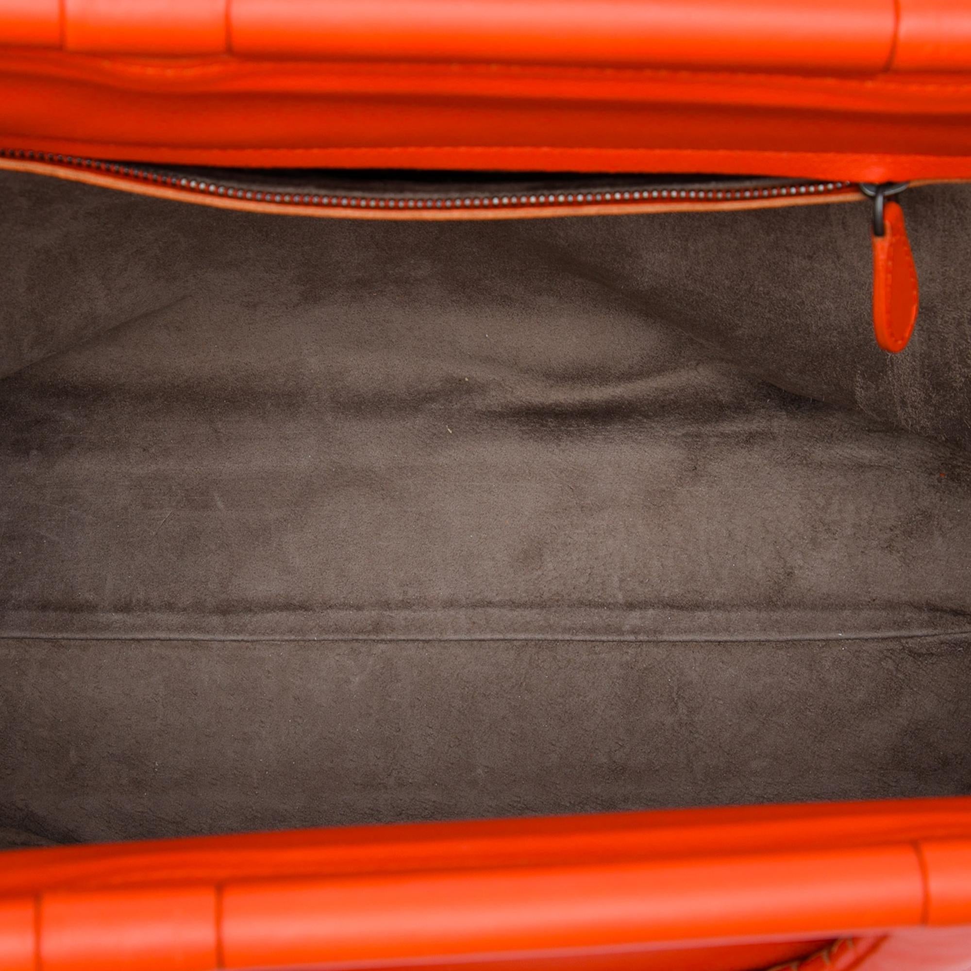 Bottega Veneta Leather Intrecciato Frame Top Handle Bag
