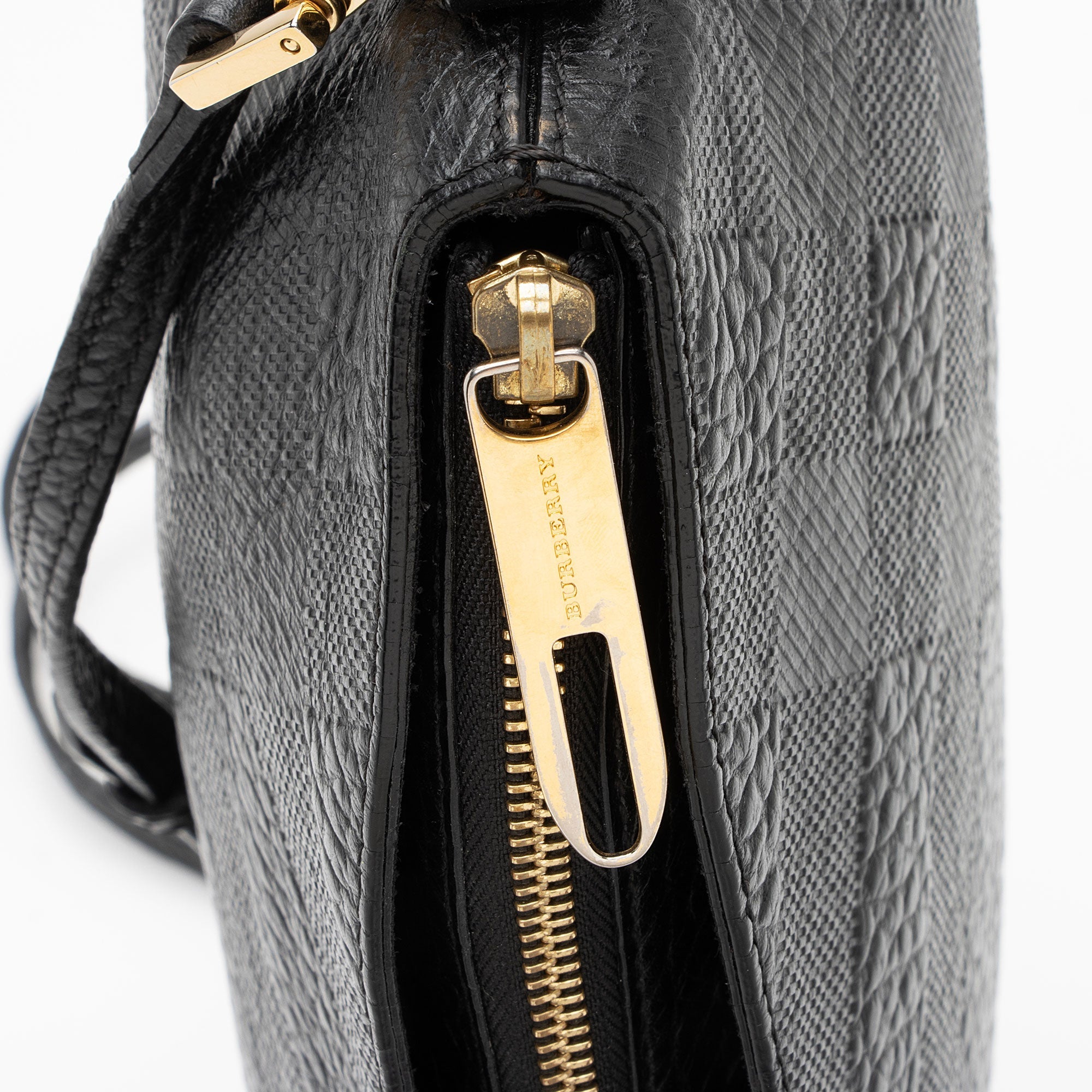 Burberry Leather Embossed Check Chichester Clutch (SHF-TC4VkJ)
