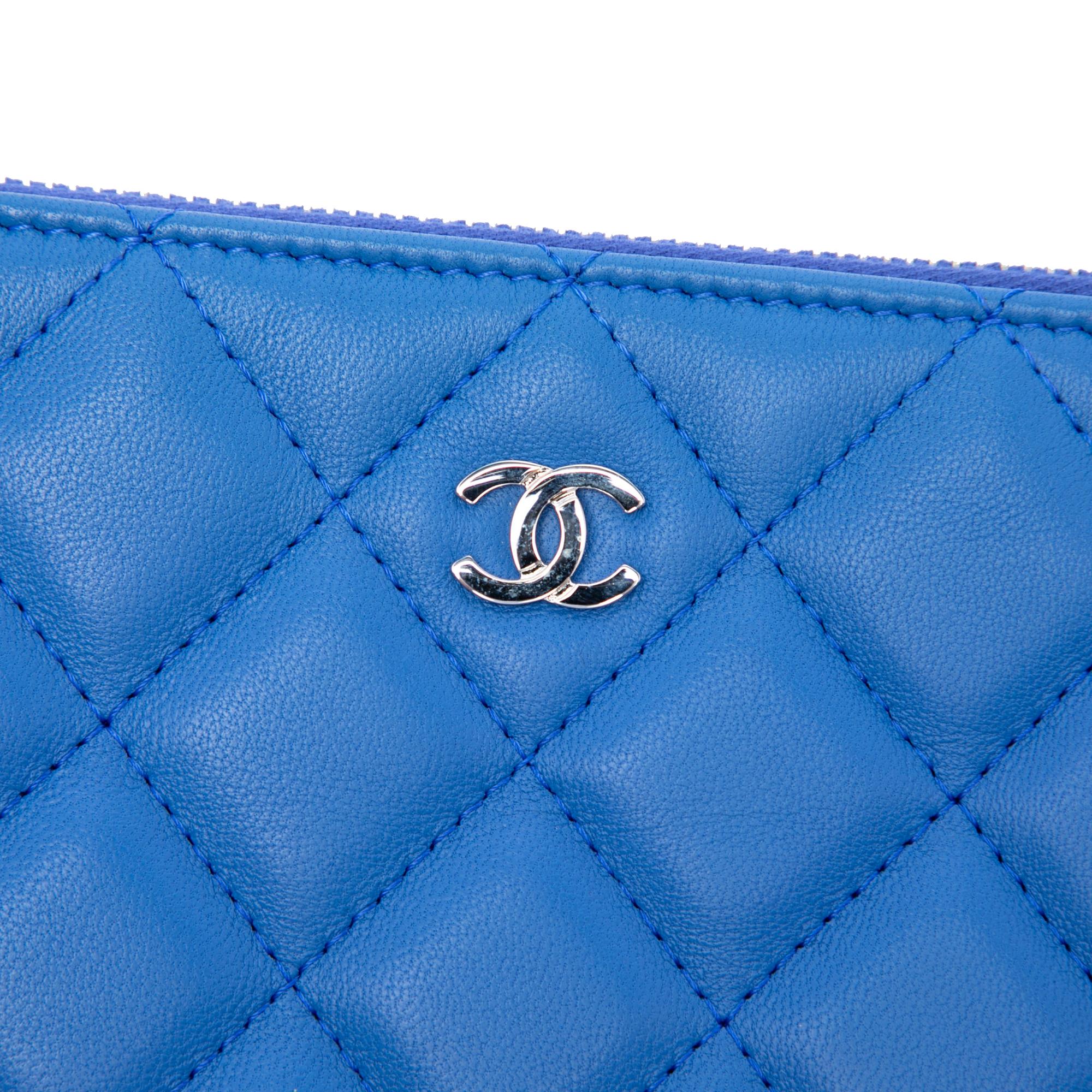 Chanel Medium Quilted Lambskin O Case Clutch