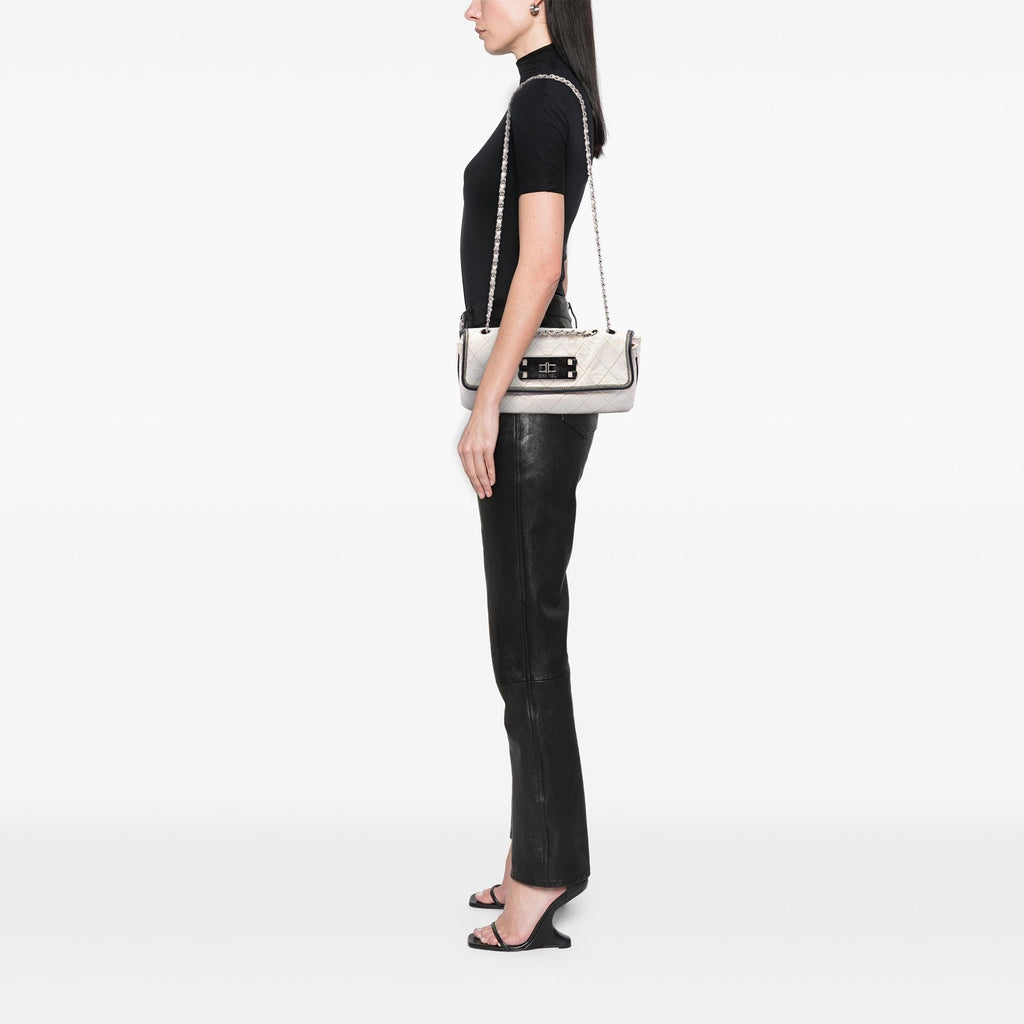 Chanel Quilted Lambskin East West Mademoiselle Flap