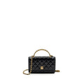 Chanel letter logo top handle flap wallet on chain shiny calfskin black  (microchip)